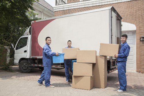 Moving boxes being loaded for a Paddington man and van service