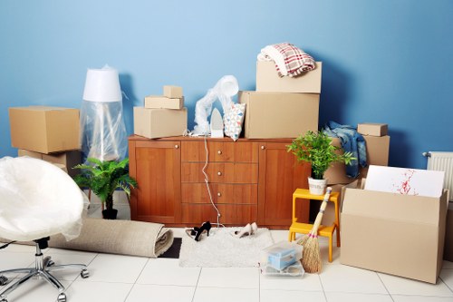 Moving home preparation in Paddington with packed boxes and planning notes