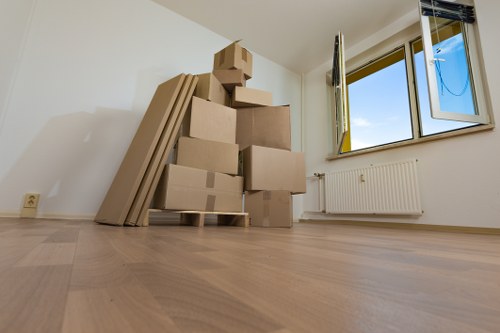 Loading furniture into a van near Paddington