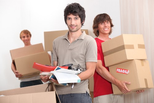 Packed office equipment ready for commercial moves in Paddington