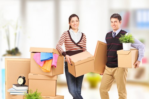 Packed boxes and furniture loaded into a removals van