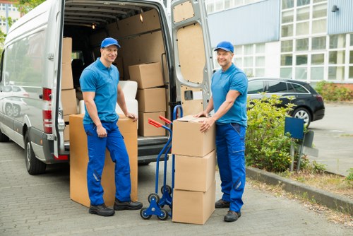 Professional team handling office furniture and equipment for a Paddington relocation