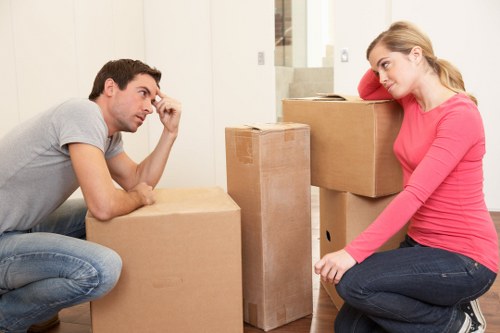 Professional team collecting old furniture from a Paddington home