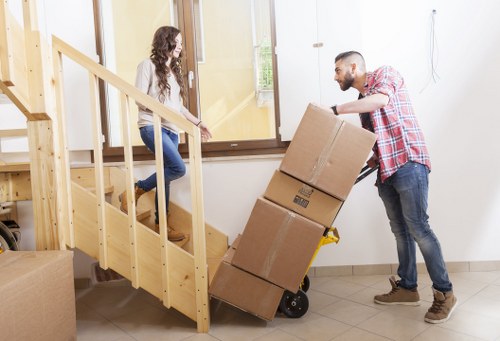 Professional movers handling a residential flat relocation in Paddington