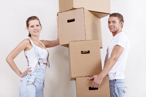 Local movers carrying boxes in Paddington